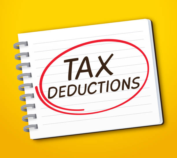 Tax Deductions Tax deductions reminder note pad writing for tax preparation. tax form stock illustrations