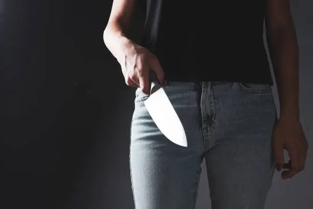 Photo of woman attacks with kitchen knife