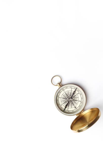 istock Golden compass on white background concept - direction, top view 1365873052