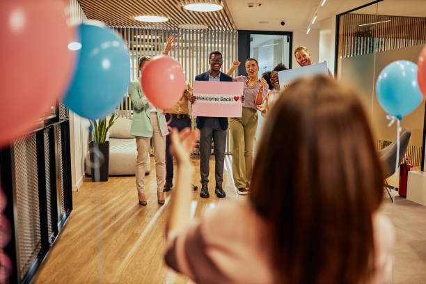 istock Colleagues prepared surprise for coworker who return to work 1365874466