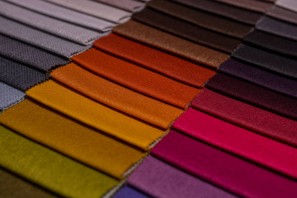 istock Samples of furniture fabrics.Multicolor fabric texture background. 1365878168