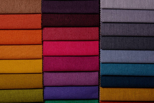 istock Samples of furniture fabrics.Multicolor fabric texture background. 1365878233