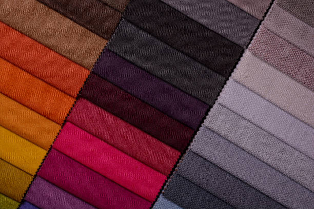 istock Samples of furniture fabrics.Multicolor fabric texture background. 1365878256