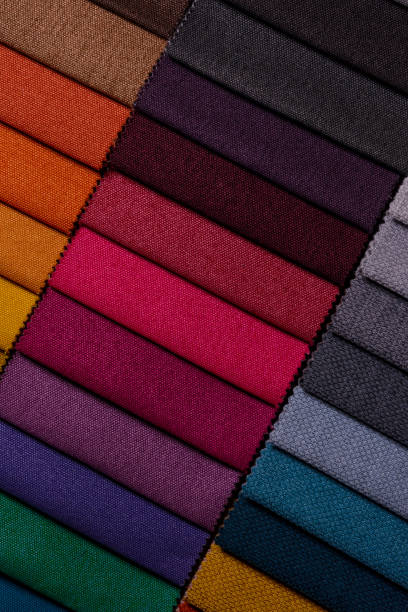 istock Samples of furniture fabrics.Multicolor fabric texture background. 1365878271