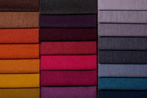 istock Samples of furniture fabrics.Multicolor fabric texture background. 1365878288