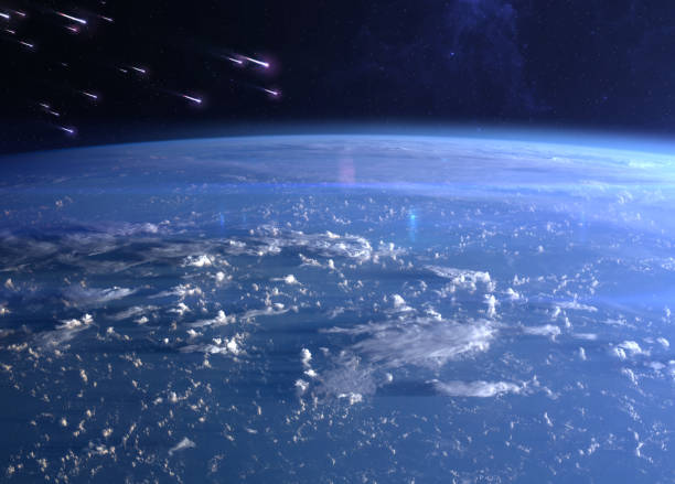 Earth and meteor shower. View of planet Earth and meteor shower. Meteor rain and Earth. Quadrantids, Lyrids, Eta Aquariids, Aquariids, Perseids, Orionids, Leonids, Geminids. Elements of this image furnished by NASA. ______ Url(s): 
https://www.nasa.gov/image-feature/sunrise-across-the-philippine-sea/
https://photojournal.jpl.nasa.gov/catalog/PIA17257
Software: Adobe Photoshop CC 2015. Knoll light factory. Adobe After Effects CC 2017. meteor shower stock pictures, royalty-free photos & images