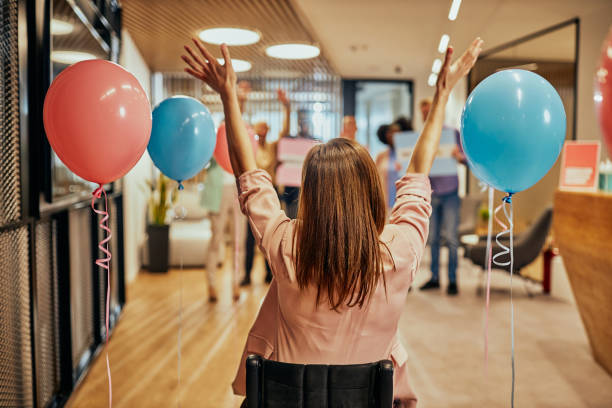 istock Woman who use wheelchair return to work 1365879838