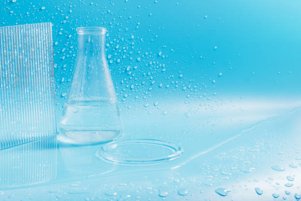 Empty podium with glass labware, flask bowl platform. Research and development of cosmetics in the laboratory. Test tubes for scientific laboratories, chemical laboratory equipment
