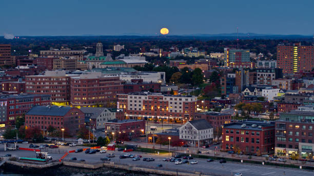 istock Moon Setting Behind Portland, Maine - Aerial 1365882378