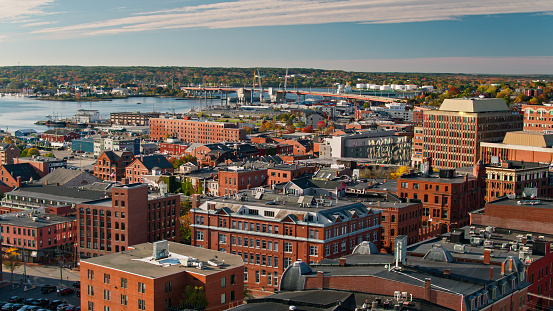 Aerial shot of Downtown Portland, Maine on a sunny morning in Fall. 
   
Authorization was obtained from the FAA for this operation in restricted airspace.
