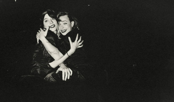 istock Two girlfriends at the cinema. 1365882865