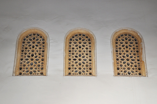 three windows with ornaments