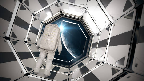 istock Astronaut looking moon outside spaceship. 1365885349