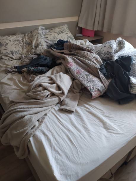 istock Messy bed in a bedroom 1365885422