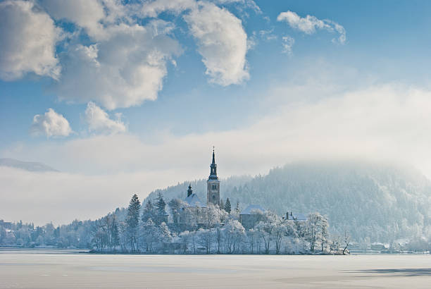 Lake Bled in winter, Slovenia The island and the church at the lake Bled. Probably the most famous place in Slovenia. gorenjska stock pictures, royalty-free photos & images