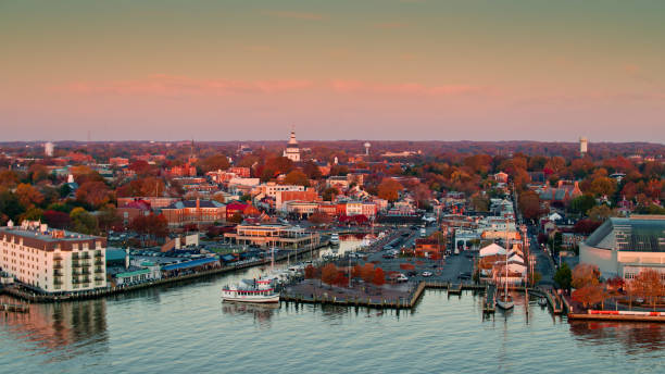 Morning Sunlight on Annapolis Waterfront and Maryland State House - Aerial Aerial shot of Annapolis at sunrise, looking across the City Dock and downtown streets towards the Maryland State House. maryland us state stock pictures, royalty-free photos & images