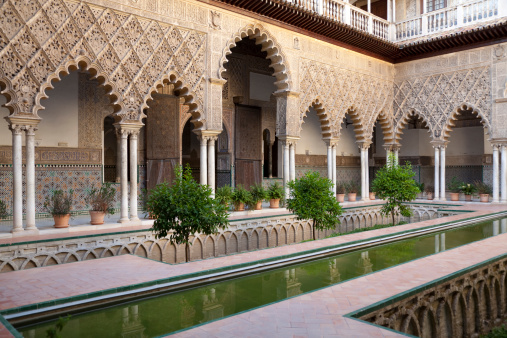 Meknes, Morocco-September 22, 2013: Architectural section from the columns and small pool inside the Moulay Ismail Tomb.