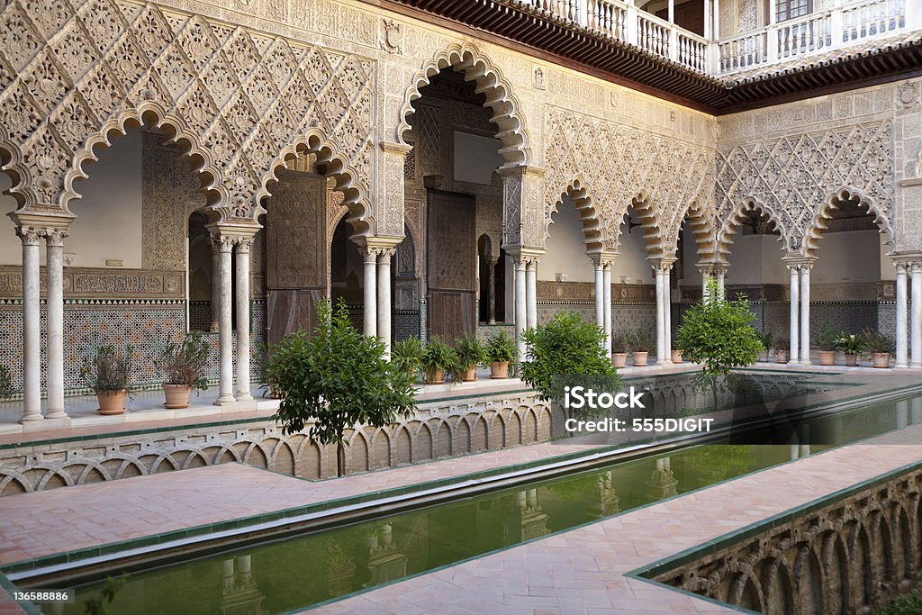 Very detailed Patio de las Doncellas, Real Alcazar, Seville One of the most beautiful landmarks in Real Alcazar Palace in Seville, Spain Alcazar Palace Stock Photo