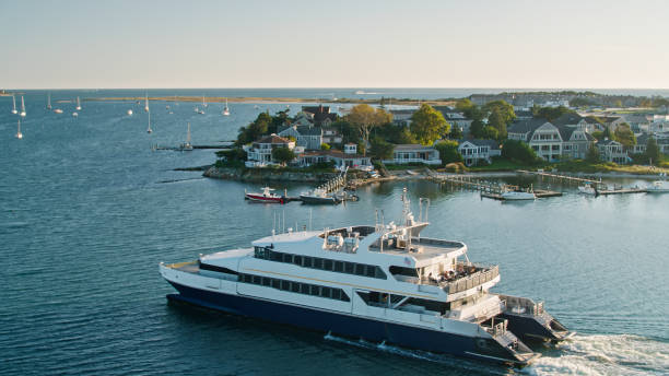Nantucket Ferry Leaving Hyannis - Aerial Aerial shot of a ferry leaving Hyannis, the "Capital" of  Cape Cod, headed for Nantucket Island.

Authorization was obtained from the FAA for this operation in restricted airspace. cape cod stock pictures, royalty-free photos & images