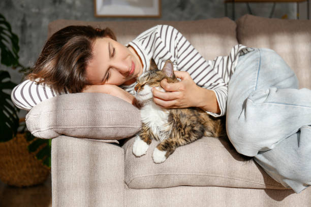 istock Woman and a cat 1365890784