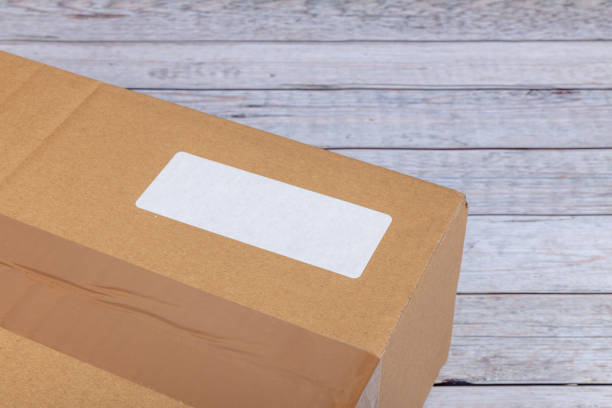 istock White label on a cardboard box delivery 1365891412