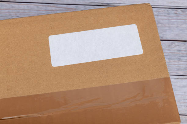 istock White label on a cardboard box delivery 1365891447