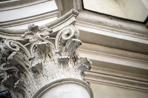 detail of the columns in a building located in the Milan duomo square.