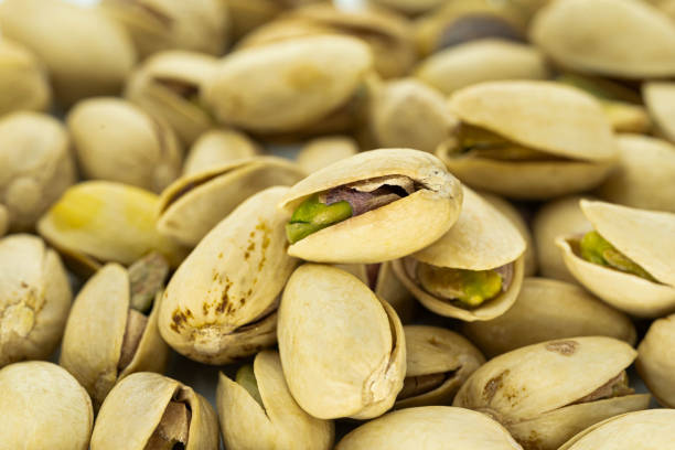 istock A lot of salted pistachio nuts. 1365892411