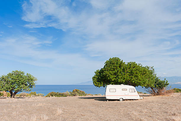 istock Caravan on camping by the sea 136589371