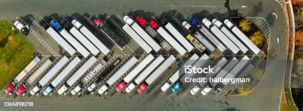 Panoramic Top Down Drone Shot Of Trucks Parked At Truck Stop Stock Photo - Download Image Now