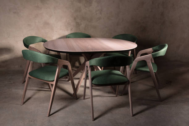istock Beautiful brown wooden folding table on beige concrete background 1365900619