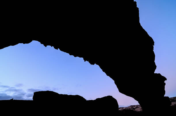 istock Natural Arch in the Desert 1365900749