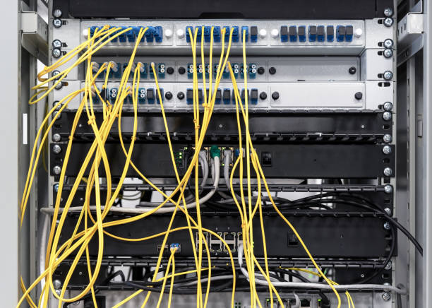 istock Electrical switchboard with yellow wires and sensors. Electrical equipment. 1365903990