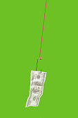 minimales-konzept-geld-zu-fangen-anordnung-aus-einer-dollar-banknote-an-einem-angelhaken.jpg?b=1&s=170x170&k=20&c=CEIn3oqRmQ9uA7UBuFKeDWt9SSRWK3thOX3qTvdZ6-E=