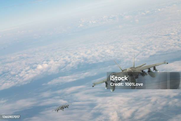 Jet Fighters Flying Over Clouds Stock Photo - Download Image Now - Fighter Plane, Above, Flying