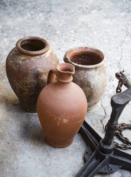 istock greek antique amphora and ceramic pots on gray background 1365907661