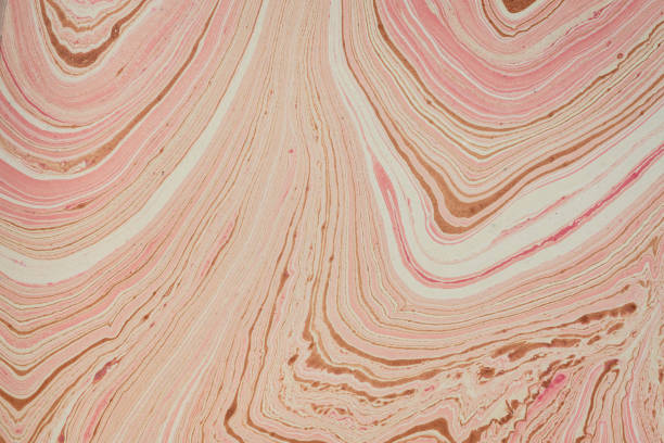 istock rose and gold marbled  paper background 1365911664