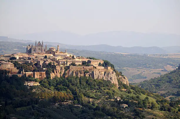 Orvieto is a city and comune in Province of Terni, southwestern Umbria, Italy situated on the flat summit of a large butte of volcanic tuff