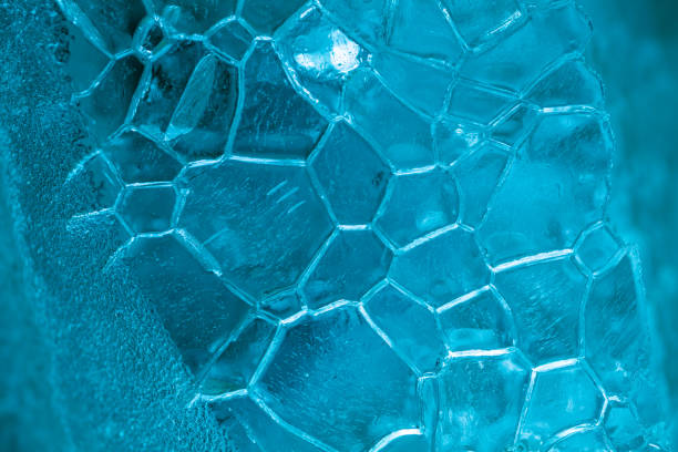 closeup of ice with colourful backlight for design purpose, textured background