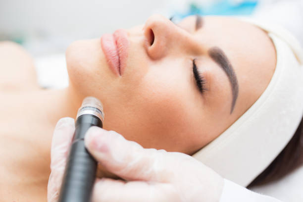 istock Close up lady on armpit laser epilation procedure 1365912885