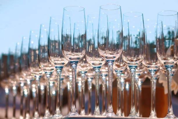 istock Background of empty glasses standing on the table close-up 1365915075