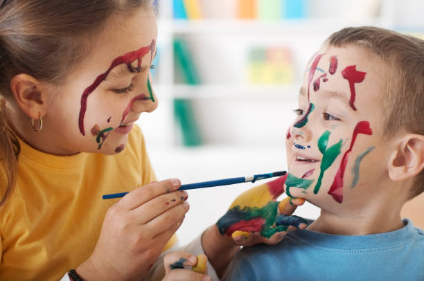 istock Children having fun painting 1365915187
