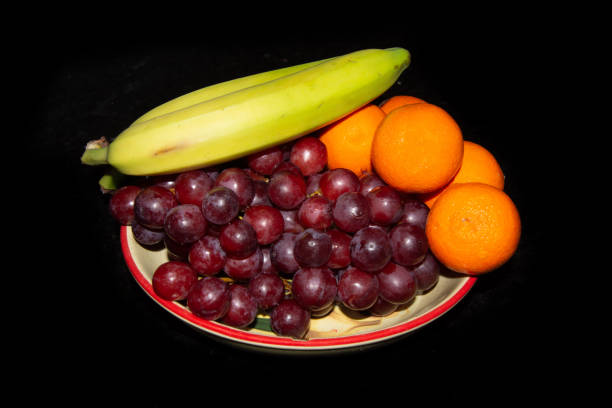 istock Banana, grapes and clementine 1365917931