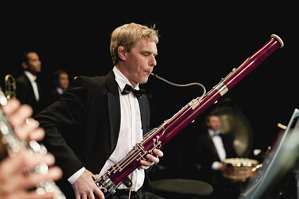 Bassoon player in orchestra  orchestra photos stock pictures, royalty-free photos & images