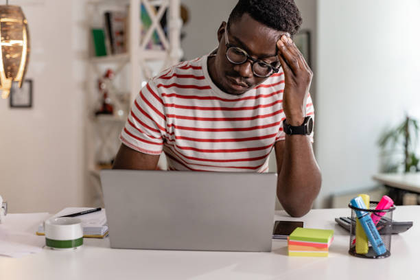 istock Stressful day and working from home for young man 1365918966