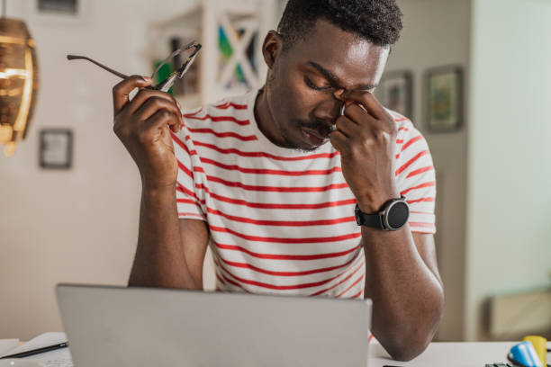 istock Stressful day and working from home for young man 1365919008