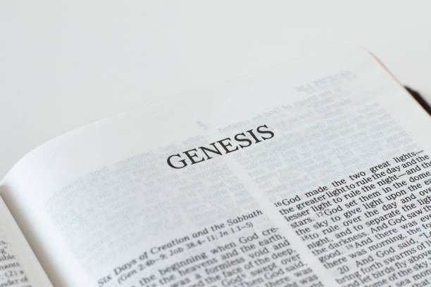 istock Genesis open Holy Bible Book close-up 1365921017