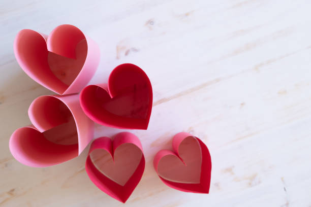 istock Pink and red paper hearts 1365923297