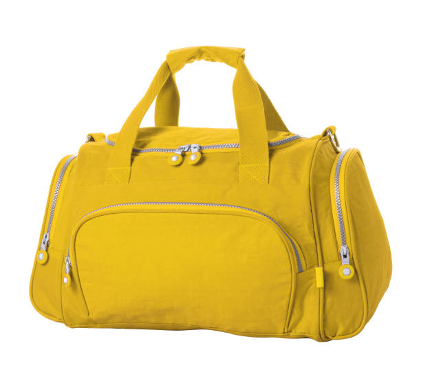 istock Textile travel bag in yellow color on a white background 1365925281