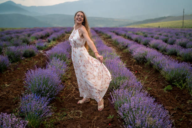 istock Young woman at a lavender field 1365925403